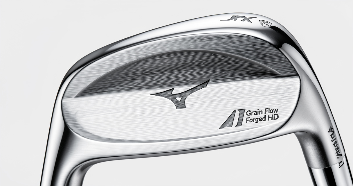 Mizuno JPX 925 Forged single iron head close-up showing forged texture and chrome finish